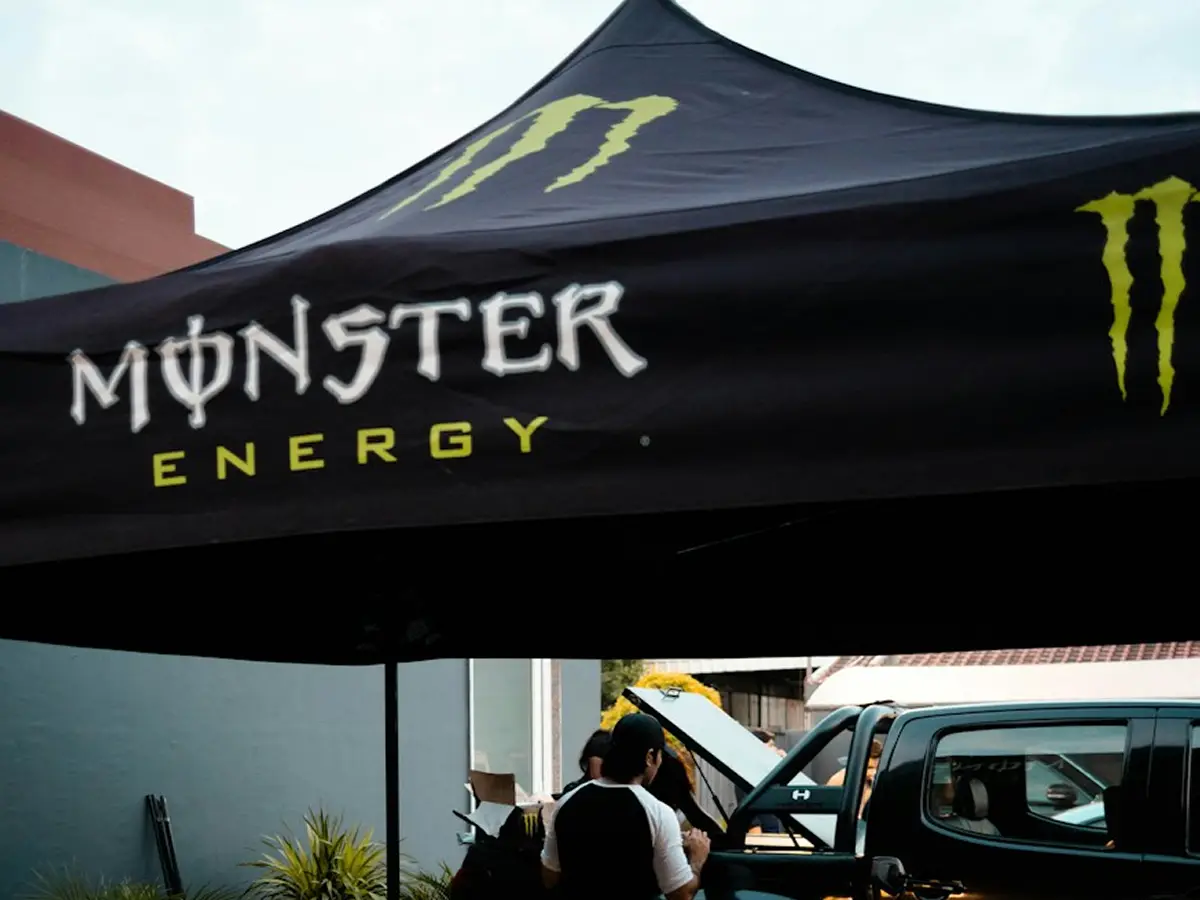 Close-up of custom event tent showing sublimation print quality, canopy material, and frame construction